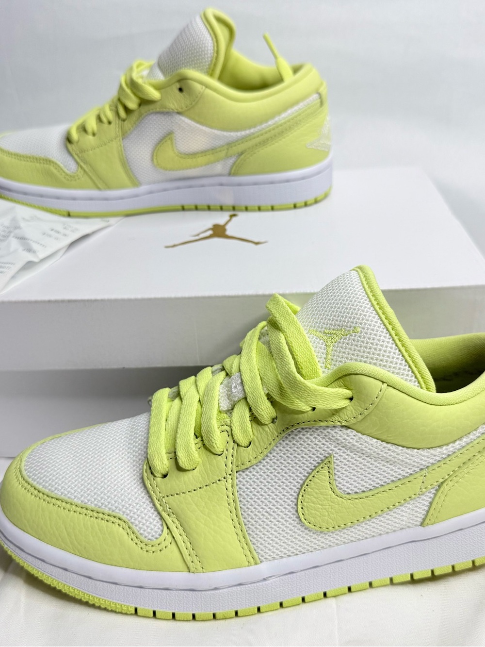 Air Jordan 1 Low SE "Limelight" sneaker, featuring a vibrant lime-green and whit